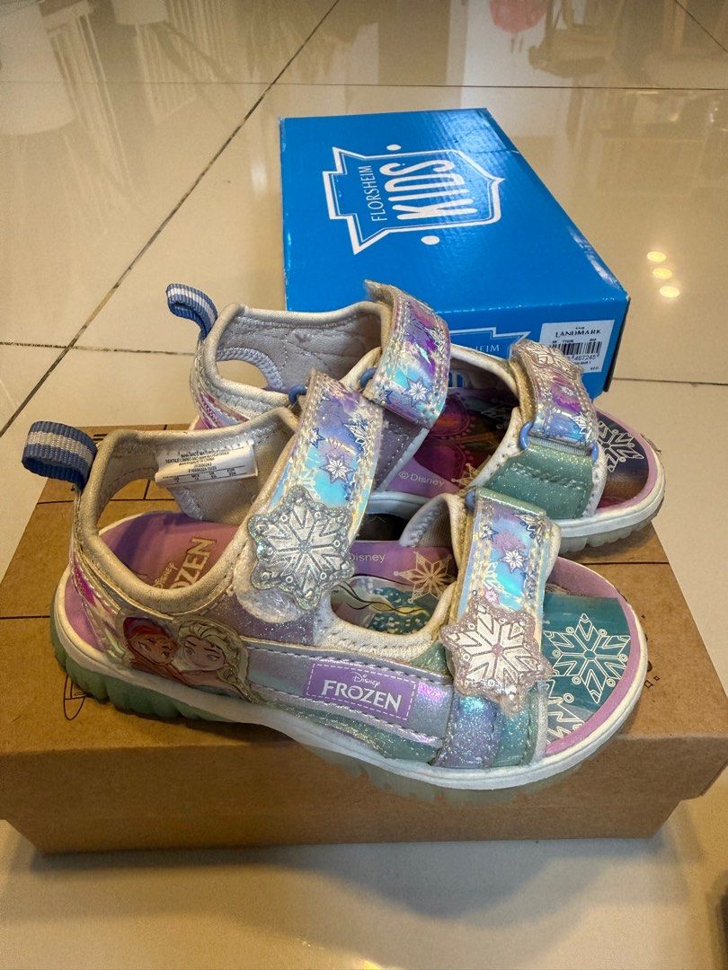 Disney Frozen Light-Up Sandals (Category: Babies & Kids Fashion) located in Kawit. Submitted by dcqm21 (Listing ID 1397870459, Image 2). Description: - Disney Frozen Light-Up sandals - All lights working - Holographic design - Adjustable straps - Size 7 - Bought from Target US - Has signs of usage, manage expectations.