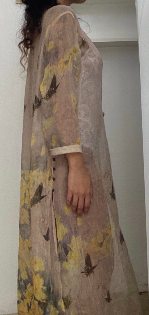 Floral Flower Kimono (Category: Coats, Jackets and Outerwear) located in Manila. Submitted by raspberryfurs (Listing ID 1397820859, Image 2). Description: - Floral and butterfly print - Long sleeves - Button-down front - Lightweight and sheer fabric - Relaxed fit - Long length - Color palette: Yellow, brown, beige.