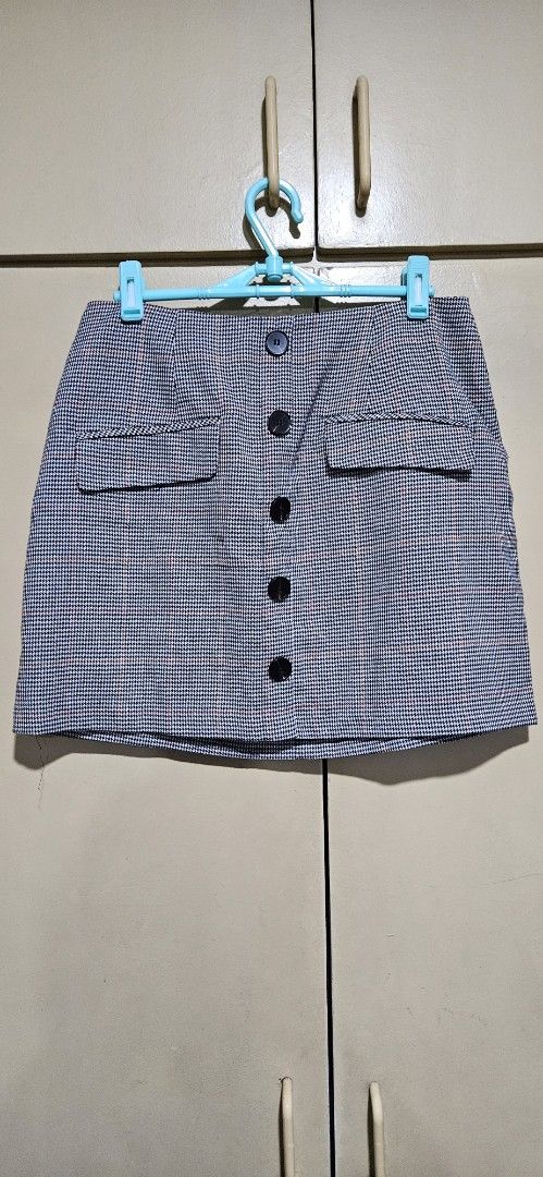 Forever 21 Contemporary Plaid Skirt (Category: Skirts) located in Quezon City. Submitted by technicolorvision (Listing ID 1397923510, Image 1). Description: - RFS: Decluttering - In very good condition; no holes, stains or tears - Plaid pattern - Button details - Two front pockets - Made in Vietnam .