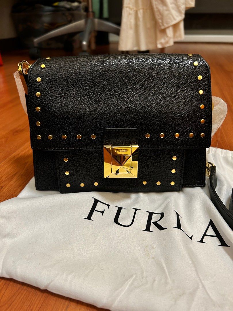 FURLA Black Crossbody Bag (Category: Luxury Bags & Wallets) located in Quezon City. Submitted by _secondhandshop (Listing ID 1397817928, Image 1). Description: - 100% authentic, bought from HK - Never been used - Includes dust bag - RFS: Decluttering.