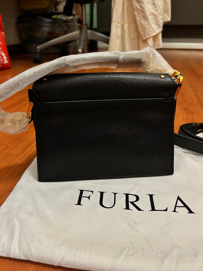 FURLA Black Crossbody Bag (Category: Luxury Bags & Wallets) located in Quezon City. Submitted by _secondhandshop (Listing ID 1397817928, Image 2). Description: - 100% authentic, bought from HK - Never been used - Includes dust bag - RFS: Decluttering.