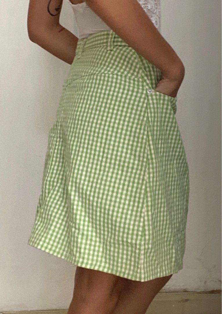 Green Gingham Skirt (Category: Skirts) located in Manila. Submitted by raspberryfurs (Listing ID 1397823463, Image 2). Description: - Green and white gingham pattern - Button and zipper closure - Functional pockets - Lightweight fabric, perfect for warm weather - Classic A-line silhouette.
