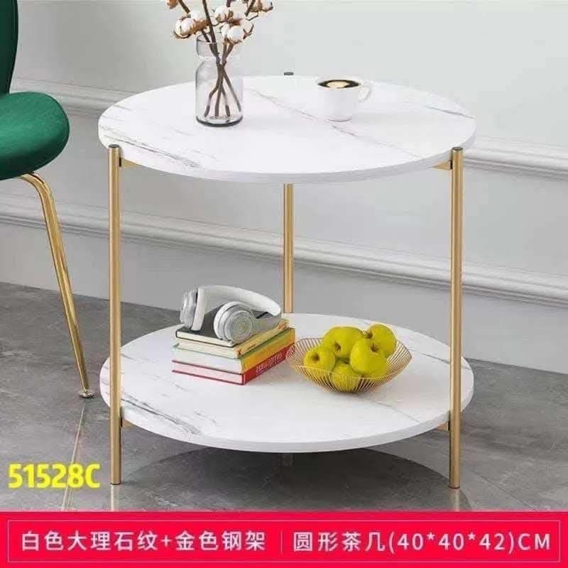 Marble Top Side Table with Gold Frame (Category: Tables & Sets) located in Manila. Submitted by lyfrancois14 (Listing ID 1397848457, Image 1). Description: - Stylish side table - White marble top with gold metal frame - Two-tier design - Dimensions: 40cm x 40cm x 40cm - Ideal for living rooms or bedrooms - Color: White marble - Material: Density board and iron.