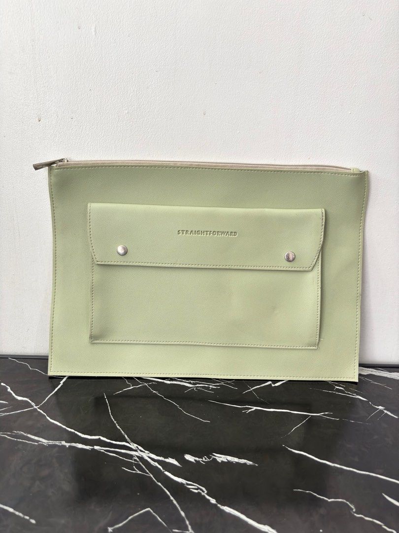 Mint Green Straightforward Laptop Sleeve (Category: Laptop Bags & Sleeves) located in Manila. Submitted by mrldelrosario.1 (Listing ID 1397894716, Image 1). Description: Condition: slight dents outside, ink stain in the front pocket (not seen outside) RFS: Decluttering Mode of Payment: Gcash/Maya Meetup: SM Light (Time depends on availability) Delivery: Lalamove/Grab (Buyer to set up delivery and payment).