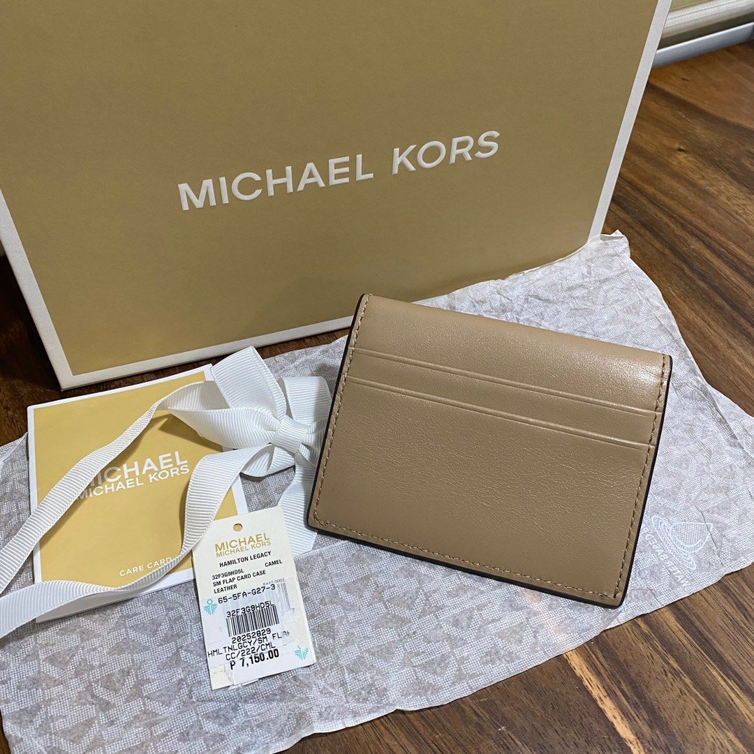 MK Hamilton Wallet ‼️RUSH SALE (Category: Luxury Bags & Wallets) located in Taguig. Submitted by santos.eliza (Listing ID 1397923154, Image 3). Description: MK Hamilton Leather Classic with box with card card with paperbag with tag.