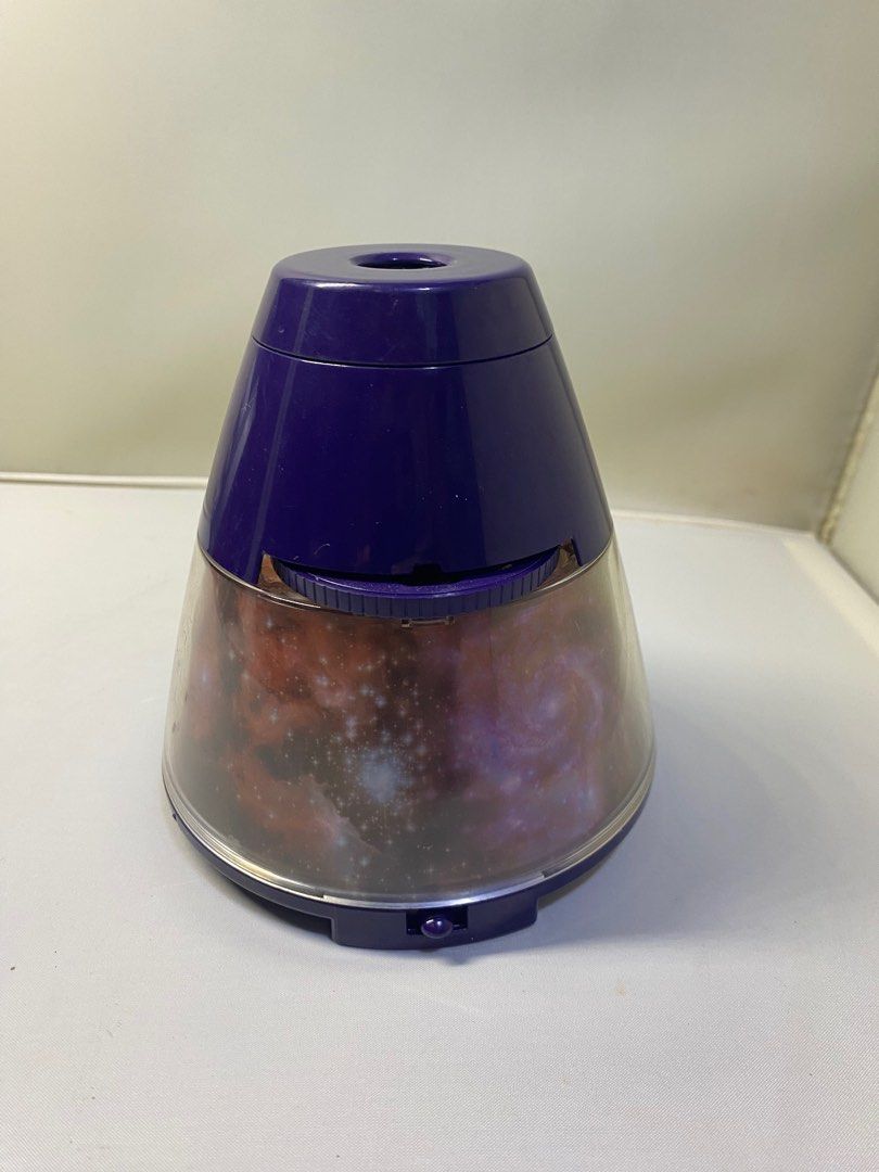 Planetarium Projector (Category: Projectors) located in Pasacao. Submitted by wengpullar37205 (Listing ID 1397939063, Image 3). Description: - Galaxy scene projector - Includes planet slides - Purple color with clear dome - Battery compartment - Made in China Battery operated.