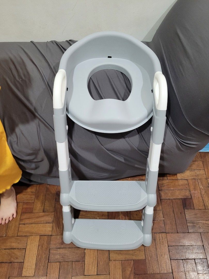 Potty training seat with step ladder (Category: Toilet Training) located in Makati City. Submitted by looneytooney (Listing ID 1397908740, Image 1). Description: never used. my toddler refused to use it..