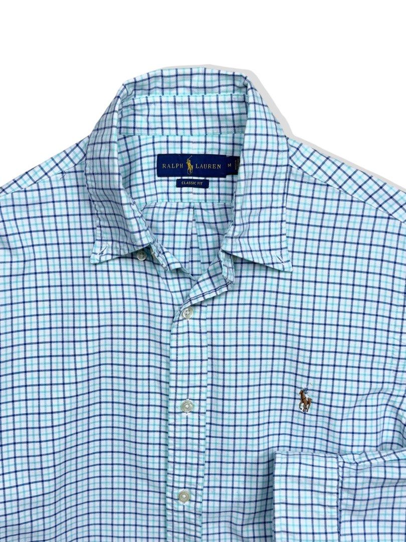 Ralph Lauren Classic Fit Checkered Shirt (Category: Tshirts & Polo Shirts ) located in Cebu City. Submitted by stylehub_ (Listing ID 1397809941, Image 1). Description: - Ralph Lauren Classic Fit shirt - Size: M -Width: 23 -Length 28/29 - Pattern: Blue and white checkered - Features a button-down collar - Embroidered Ralph Lauren logo - Made in the Philippines.