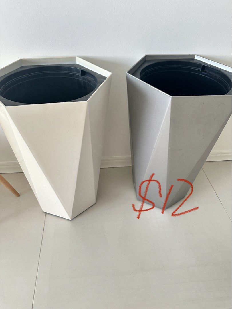 Rectangular Planter Boxes (Category: Pots & Planters) located in Singapore. Submitted by stephy.mama (Listing ID 1379139254, Image 3). Description: Set of four rectangular planter boxes, perfect for herbs, flowers, or small plants. They are used but still in good condition. The boxes are stackable for easy storage when not in use. Soil is included. 4.5 for each.