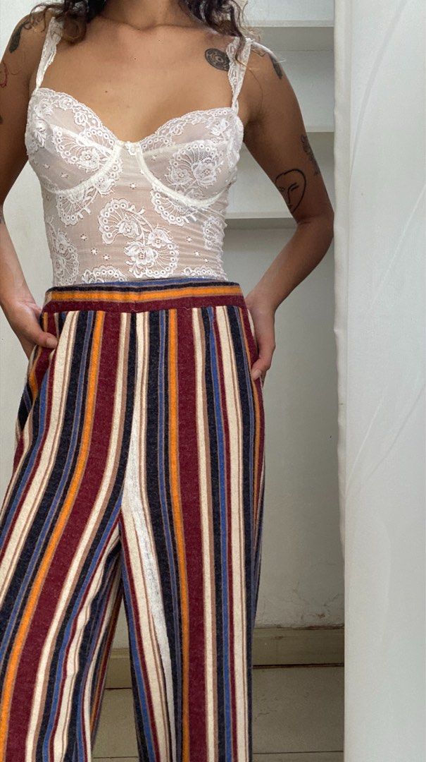 Striped Wide Leg Pants (Category: Other Bottoms) located in Manila. Submitted by raspberryfurs (Listing ID 1397824082, Image 3). Description: - Vertical stripe pattern - Wide-leg design - Comfortable fit - Soft, flowing fabric - Solid color waistband - Perfect for casual wear.