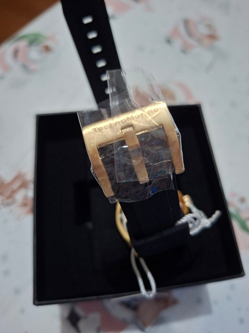 TechnoMarine Gold Plated Watch (Category: Men's Watches) located in Pasay City. Submitted by Tini_winnie (Listing ID 1397909271, Image 3). Description: - TechnoMarine watch - Model: sea manta - Gold-plated case - Blue bezel - Dark blue dial - Gold-tone hands and markers - Black rubber strap - Includes original box - New and unworn - From US - 42mm - mop: gcash or bpi.
