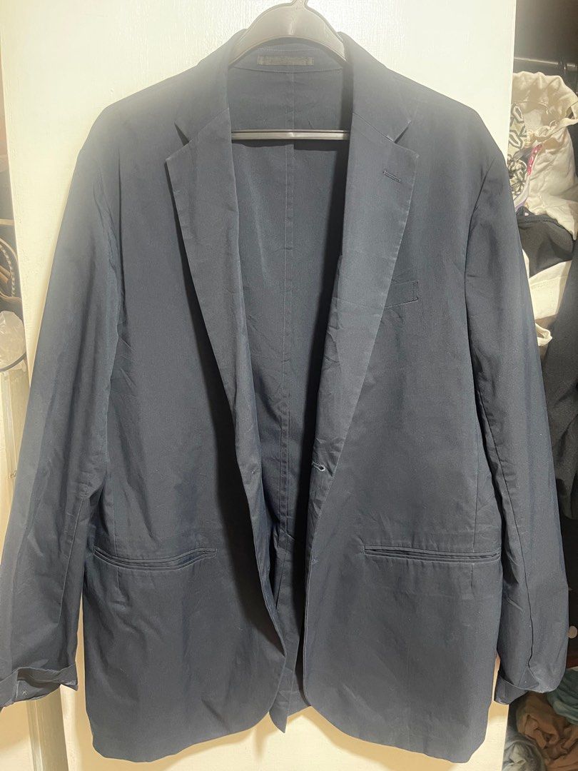 Uniqlo Slim Fit Blazer (Category: Formal Shirts) located in Paranaque City. Submitted by twinmanila (Listing ID 1397817867, Image 1). Description: - Uniqlo navy blue blazer - Slim fit - Single-button closure - Two front pockets - Inner pocket - Uniqlo brand tag lightweight.