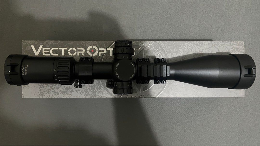 VECTOR OPTICS TOUREX 6-24X50 FFP (SCFF-19) Scope (Category: Combat Sports) located in Quezon City. Submitted by loisranulf02 (Listing ID 1397970509, Image 3). Description: VECTOR OPTICS TOUREX 6-24X50 FFP (SCFF-19) Scope Price: 15,000 negotiable Condition: Almost Brand New condition Inclusions: 1. one pair of 30mm picatinny scope rings 2. flip-up caps 3. Vector Optics SCACD-23 level 30mm One Piece MOUNT Cantilever ACD Mount BK (separate purchase,