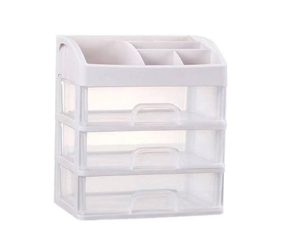 White 3-Layer Makeup Organizer (Category: Makeup) located in Manila. Submitted by lyfrancois14 (Listing ID 1397782442, Image 2). Description: - White makeup organizer - Features three clear drawers - Top section with multiple compartments - Designed for cosmetics and skincare storage - Keeps products organized and accessible - Drawers have handles for easy use - Perfect for a tidy vanity or bathroom counter.