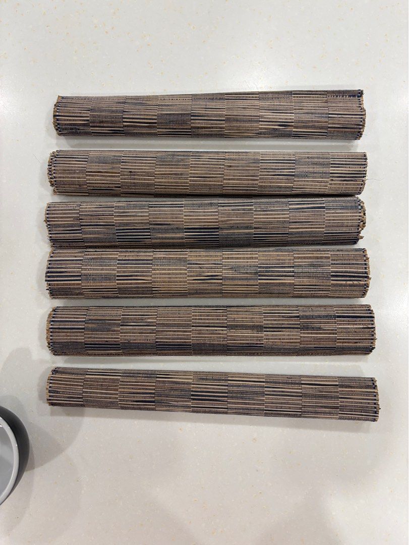 Woven Placemats Set (Category: Table Linen & Textiles) located in Quezon City. Submitted by marlo19 (Listing ID 1397871791, Image 3). Description: Woven placemats set of 6 Striped pattern (brown and blue) Rfs: switched to plastic placemats .