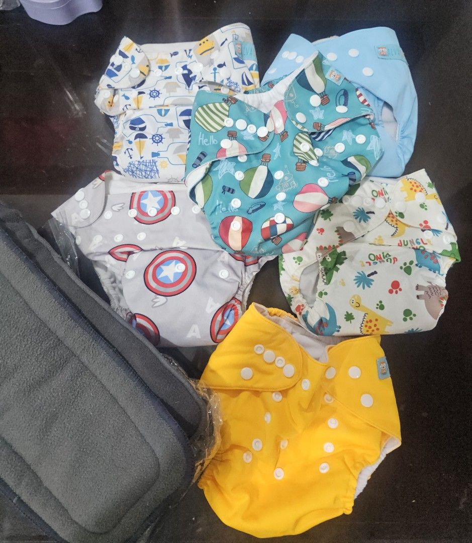 6 Cloth Diapers with 6 extra inserts (total of 12 inserts) (Category: Diapers & Baby Wipes) located in Taguig. Submitted by thriftymhum (Listing ID 1398057610, Image 1). Description: Rarely used dahil hindi kaya ng powers ko pala..