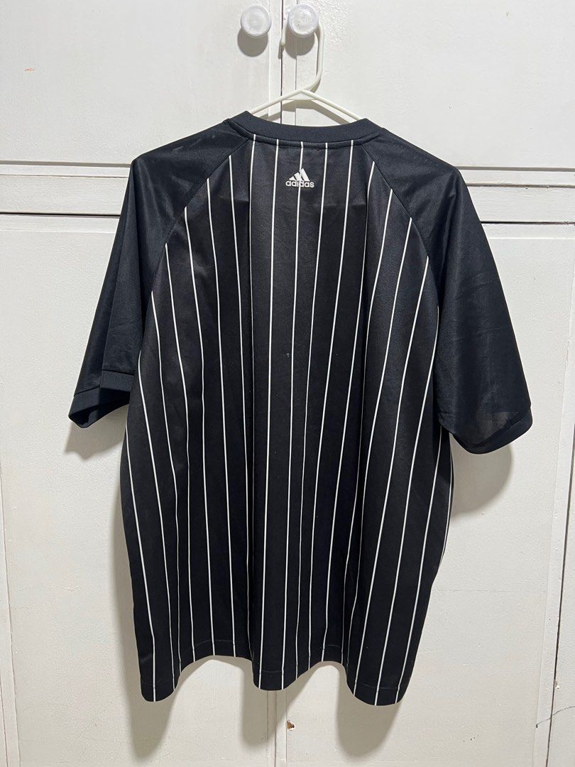 Adidas Germany 2006 World Cup Jersey (Category: Activewear) located in Cebu City. Submitted by tr1balmunk1 (Listing ID 1398130226, Image 1). Description: - Official Adidas Germany 2006 World Cup jersey - Size: XL - Design: Black and white striped - Features: German national team crest, three stars, "deutschland" embroidery on sleeve - Manufacturing: Made in Indonesia - Armpit to Armpit 24" - Length 28".