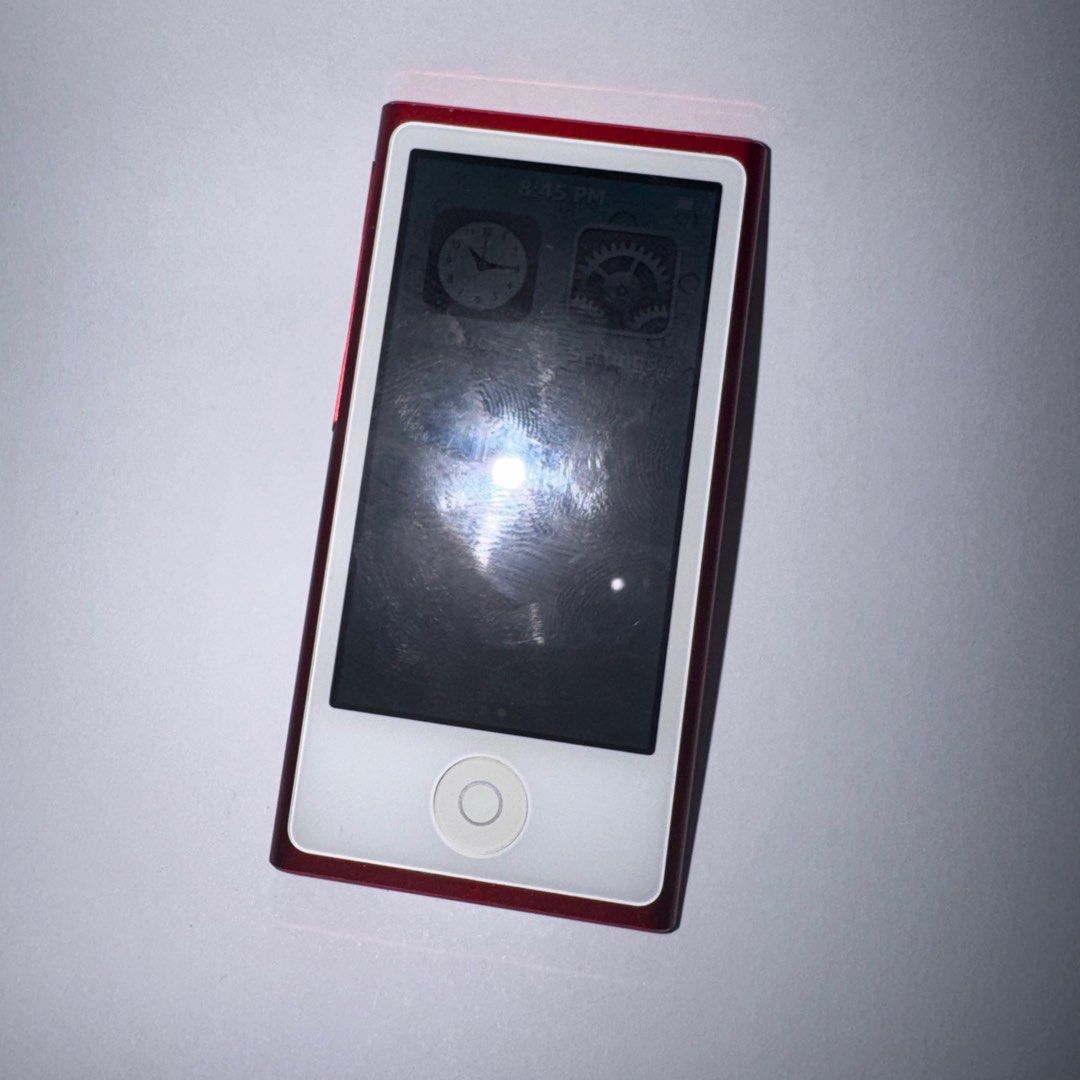 Apple iPod Nano Red Product Red (Category: Portable Music Players) located in Mandaluyong City. Submitted by username_optional (Listing ID 1398105180, Image 3). Description: - Red Apple iPod Nano - Color display - Displays clock and settings - Apple logo and iPod branding on the back - In good working condition - Has custom engraving on the back - as is what you can see - unit only no other inclusions UNIT ONLY There are some flaws on detailing b
