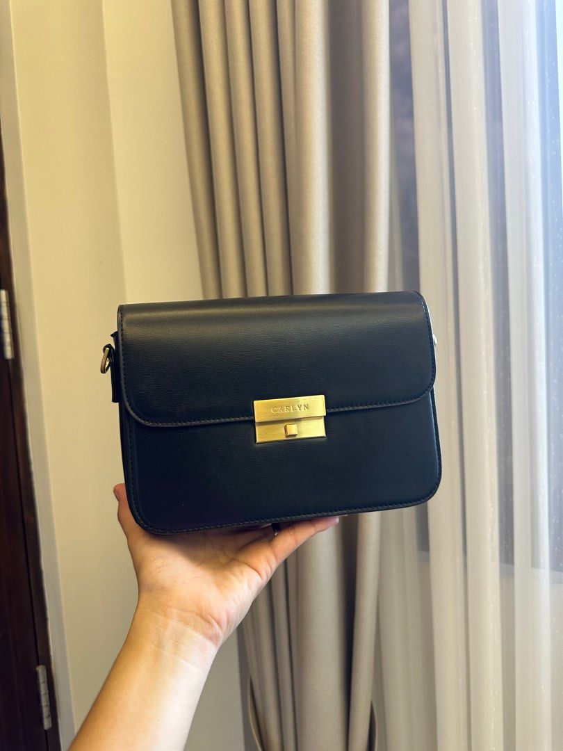 Carlyn Black Handbag (Category: Cross-body Bags) located in Dagupan City. Submitted by thymeph (Listing ID 1398017298, Image 1). Description: With strap only. 3x lightly used only. .