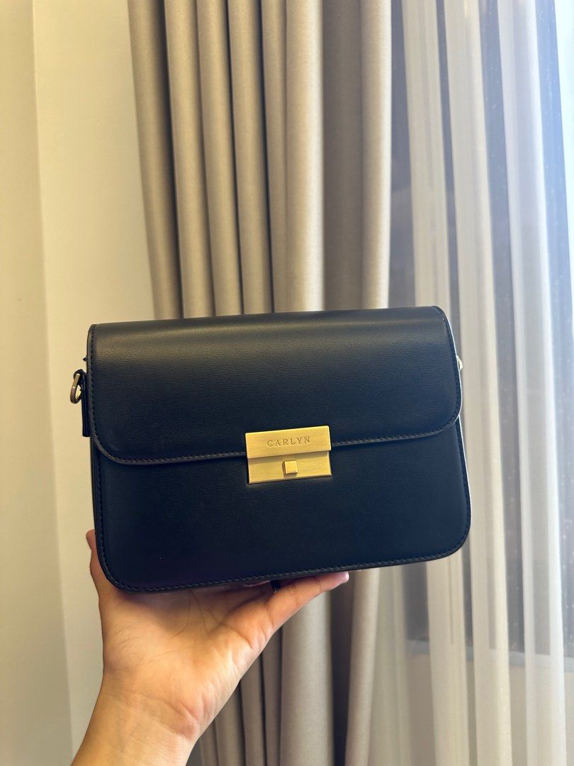 Carlyn Black Handbag (Category: Cross-body Bags) located in Dagupan City. Submitted by thymeph (Listing ID 1398017298, Image 3). Description: With strap only. 3x lightly used only. .