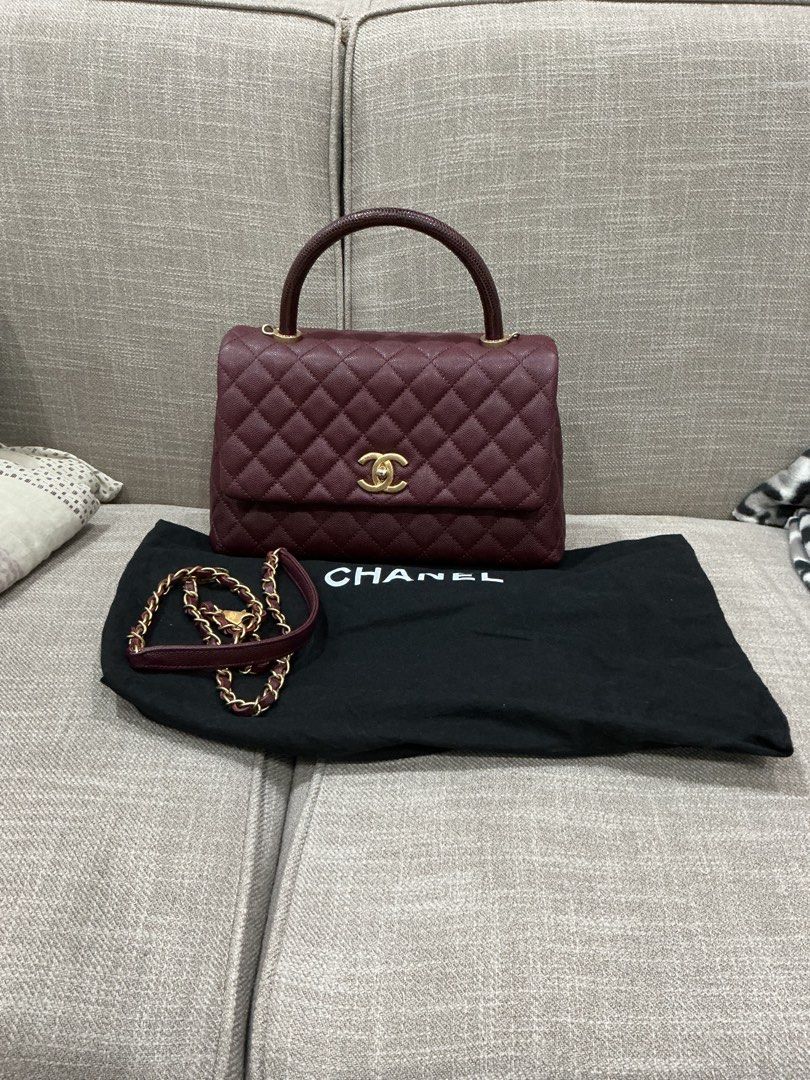 Chanel Coco Lizard Handle Bag (Category: Luxury Bags & Wallets) located in Manila. Submitted by myluxefix (Listing ID 1398164388, Image 1). Description: - Chanel Coco Handle bag - Rich burgundy color - Top handle and detachable chain strap - Quilted design - Iconic Chanel logo - Complete with box, dustbag and receipt .