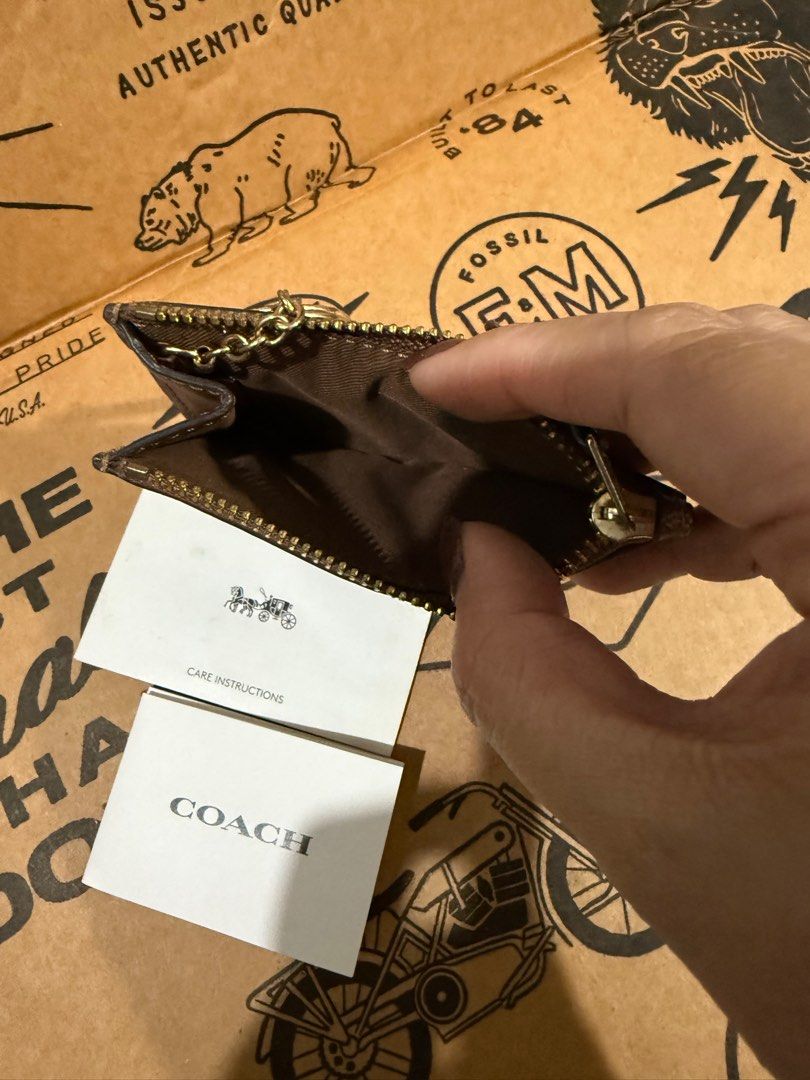 Coach Card Case Coin Purse Wallet (Category: Luxury Bags & Wallets) located in Paranaque City. Submitted by sillybella (Listing ID 1398025695, Image 2). Description: COACH MINI SKINNY ID CASE IN SIGNATURE CANVAS Signature coated canvas| Credit card slot and ID window| Zip-top closure, fabric lining| Attached split key ring| 4 1/4” (L) x 3” (H) x 1/2” (W) Style No. f16107 Like new Presentable looking 100% original coach card case / coin purse wall