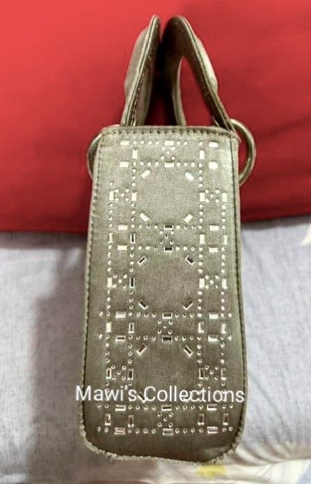 Lady Dior Limited Edition Grey Satin Bag (Category: Luxury Bags & Wallets) located in Cavite. Submitted by maisonmave.ph (Listing ID 1398013474, Image 3). Description: Dior Lady Dior Limited Edition Grey Satin Bag Grey satin with crystal Cannage embellishment. Details: - Size: W17 × D7.5 × H14 cm - Good condition with minor flaws: - Flap interior: Slight scratches - Body/handles/interior: Slight stains - Hardware: Slight scratches - Missing zippe