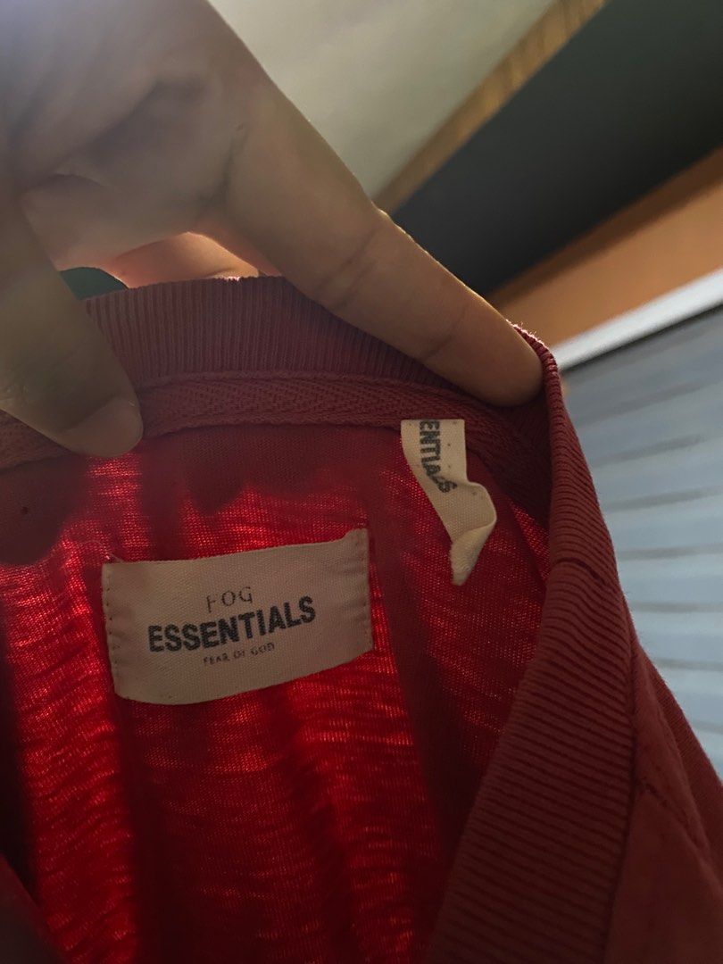 Fear of God Essentials Red T-shirt (Category: Tshirts & Polo Shirts ) located in Bacolor. Submitted by kheingegante22 (Listing ID 1398150695, Image 2). Description: ESSENTIALS TSHIRT L - 27 , W - 23 Needwash , Hairline crack.