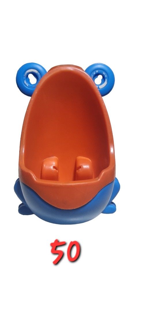 Frog-Shaped Potty Training Urinal (Category: Toilet Training) located in Marikina City. Submitted by andreah_16 (Listing ID 1398000717, Image 3). Description: - Frog-shaped potty training urinal - Designed for toddlers - Fun blue and orange colors - Cute frog design - Price: 50 pesos.