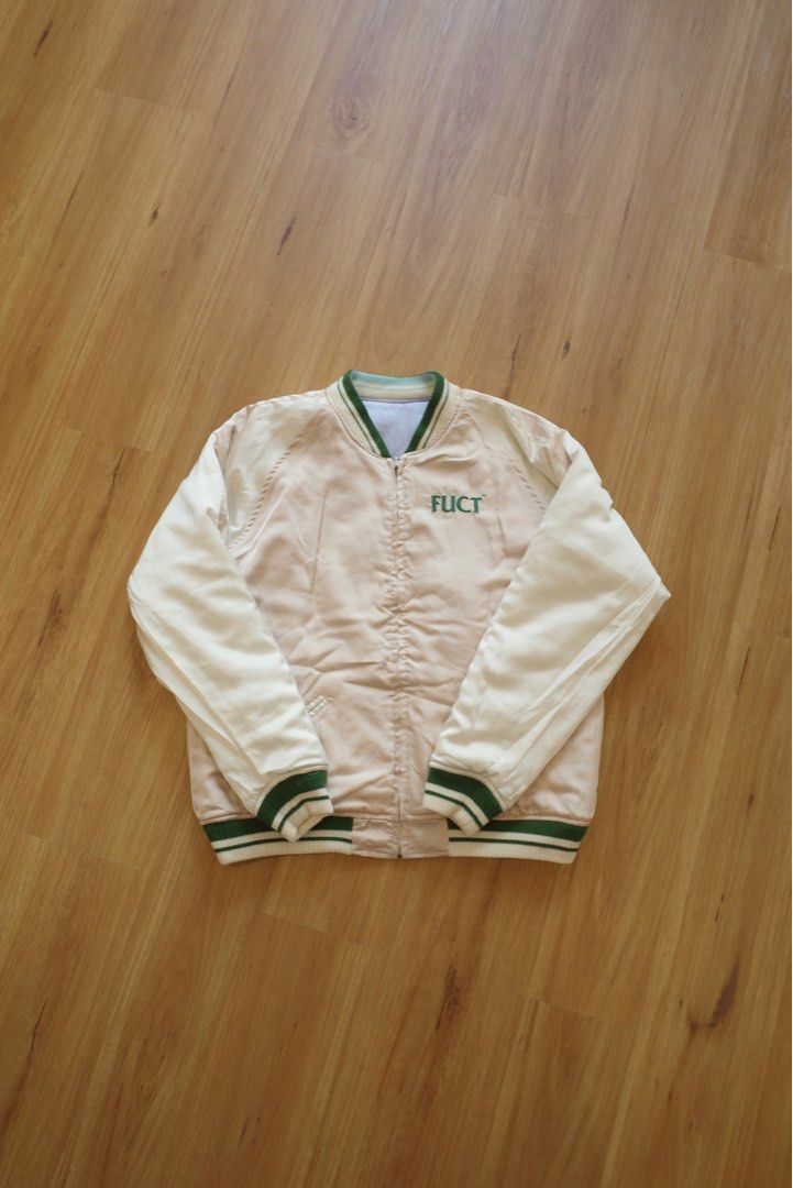 Fuct SSDD Reversible Souvenir Jacket (Category: Coats, Jackets and Outerwear) located in Quezon City. Submitted by rinse___repeat (Listing ID 1322354269, Image 3). Description: FUCT SSDD Reversible Souvenir Jacket Serving up two jackets in one design, FUCT SSDD’s take on the Souvenir Jacket features a satin construction with an embroidered eagle design to the chest of one side, whilst the alternative side features the brand’s logo embroidered in 