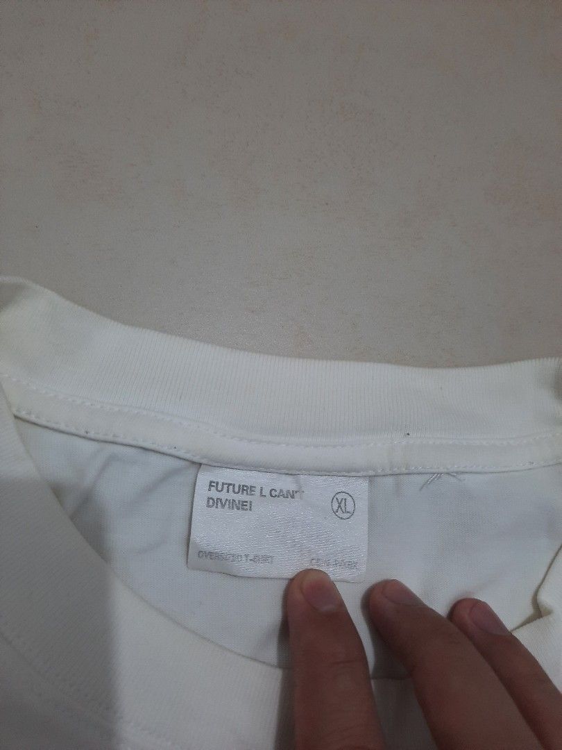 Future L Chain Divinel T-shirt XL (Category: Tshirts & Polo Shirts ) located in Pasig City. Submitted by thousandthrift69 (Listing ID 1398028788, Image 3). Description: Color may vary due to lighting No issue / Need wash Excellent Condition 💎 Color rate: 9/10 Size: Large on tag ( L - XL fitting ) Dimension: L28.5xW24 Swipe right for more details ⬅️ MINE for only P300 ❤ + Shipping Message us for inquiries 📩 Follow for more.