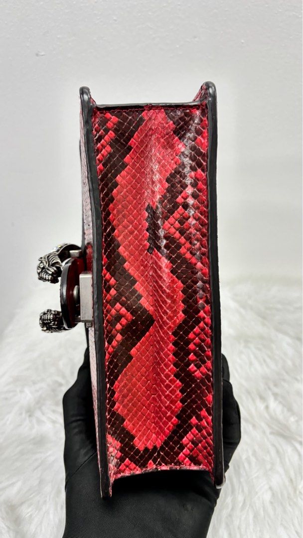 Gucci Dionysus Red Python Shoulder Bag (Category: Luxury Bags & Wallets) located in Taguig. Submitted by shoppersluxe2394 (Listing ID 1397990875, Image 3). Description: - Authentic Gucci Dionysus shoulder bag - Eye-catching red python exterior - Silver chain strap - Crystal-embellished tiger head closure - Structured shape - Flap closure - A statement accessory.