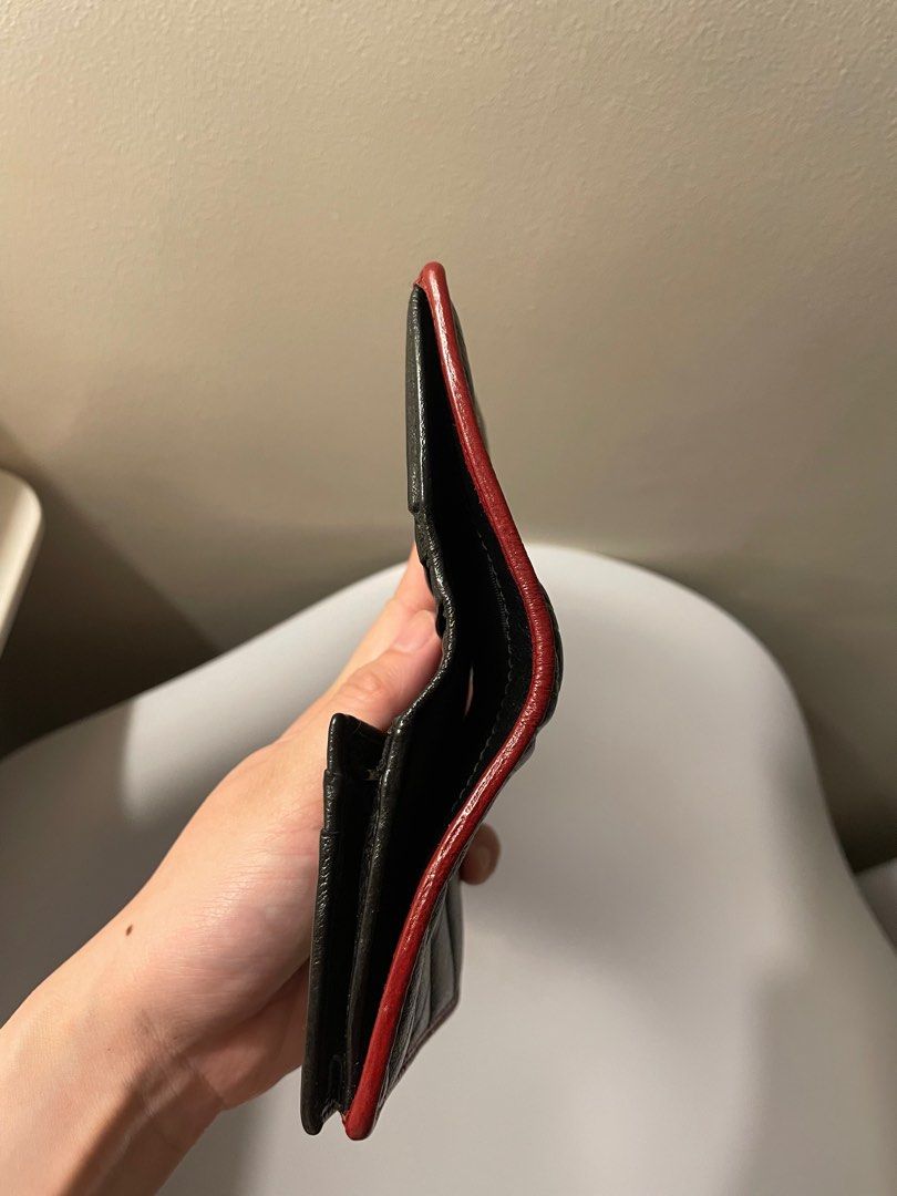 Gucci GG Marmont Card Case Wallet (Category: Luxury Bags & Wallets) located in Quezon City. Submitted by yzziefinds (Listing ID 1398158953, Image 3). Description: - CHEAPEST you can get for an AUTHENTIC GUCCI wallet/card case - Black matelasse leather exterior with red trim - Gold-tone GG logo - Multiple card slots - Zippered compartment - Snap closure - Leather interior lining Issue: medyo masikip for PH paper bill pero kasya pa rin, titiklop la