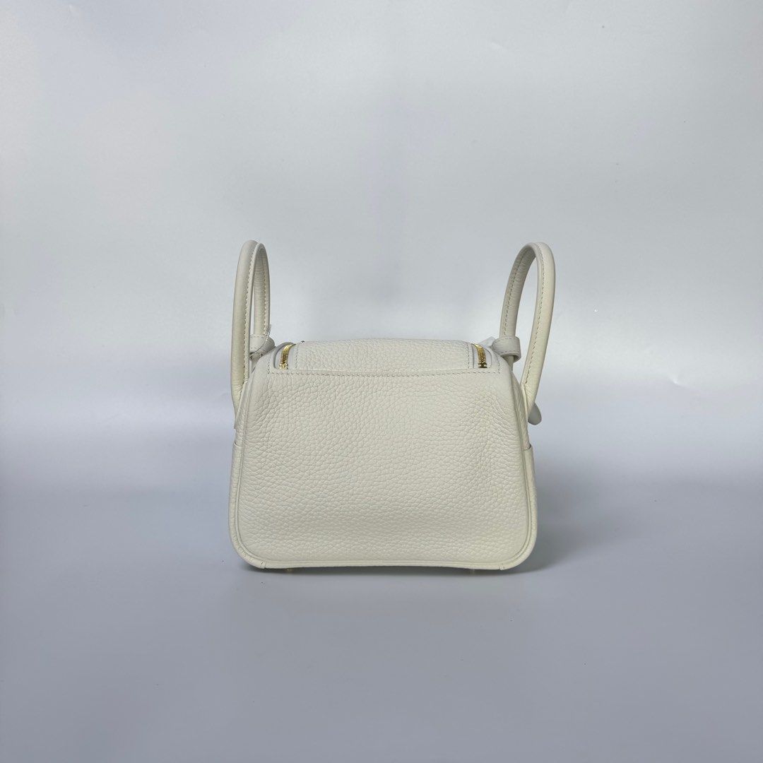 HERMES MINI LINDY CLEMENCE WHITE (Category: Luxury Bags & Wallets) located in Manila. Submitted by cjv.luxury (Listing ID 1398022316, Image 3). Description: CJV- 01069 Inclusions: DR.RUNWAY, DUSTBAG & BOX All items are available for 3 months layaway For cash buyers, items are negotiable. Just shoot your offer Trades are welcome, you can bring other luxury bags/items that you wish to sell and we can convert it to store credit. 100 We are an Entrup