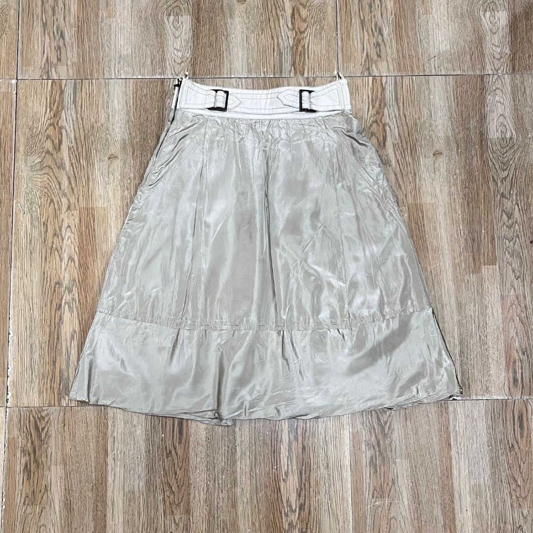 Louis Vuitton Beige Skirt (Category: Luxury Apparel) located in Bacolod City. Submitted by boujee.wardrobes (Listing ID 1398155235, Image 3). Description: - Authentic Vintage Louis Vuitton skirt from Marc Jacobs era - Beige color with white waistband and accents - Features LV logo zipper - Made in France, size 38 - Pleated design with subtle sheen size 38 on tag waist: 25-27 adjustable length: 24.5.