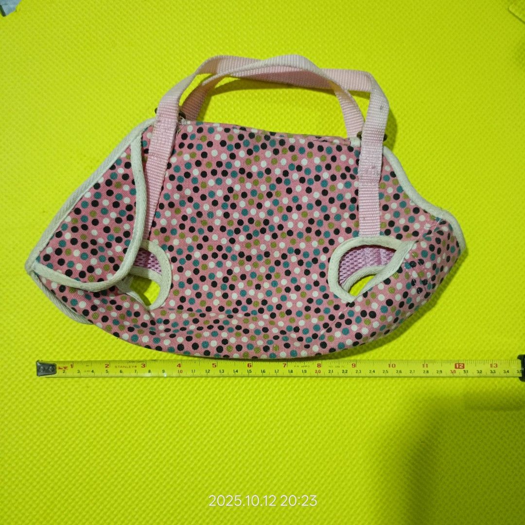 (Bundle )Lucky Dog Muzzle and Pet Carrier (Category: Homes & Other Pet Accessories) located in Pasig City. Submitted by journashop (Listing ID 1398068163, Image 3). Description: Includes a yellow Lucky Dog muzzle with a grey strap and a pet carrier with two S-hooks. The carrier is dark green with a mesh design. Also included is a pink pet carrier with a polka dot pattern and pink straps. Perfect for pet owners looking for convenient and stylish a