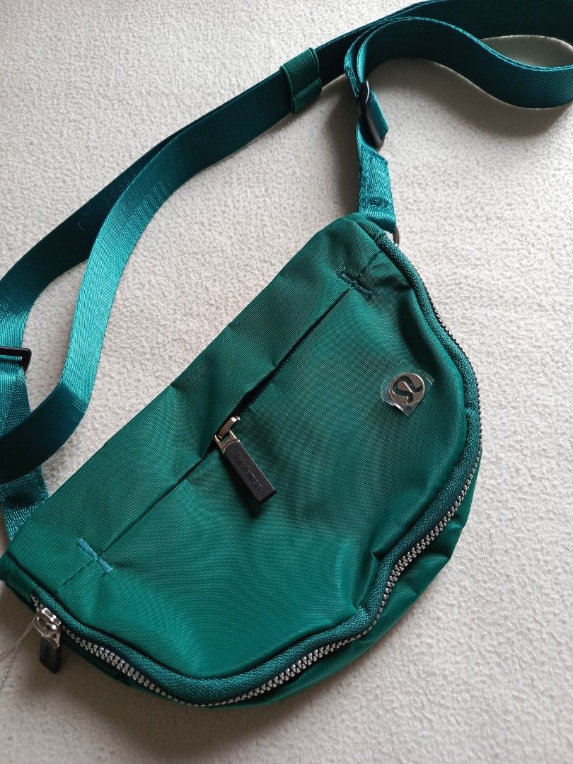 Lululemon Everywhere Belt Bag - Green (Category: Cross-body Bags) located in Cavite. Submitted by aeries06 (Listing ID 1398039460, Image 2). Description: note: this is not authentic - Lululemon Everywhere Belt Bag - Stylish and practical design - Zippered main compartment - Adjustable strap for a custom fit - Front pocket for easy access - Made of durable, water-resistant material - Sleek design with subtle logo - Vibrant green color.