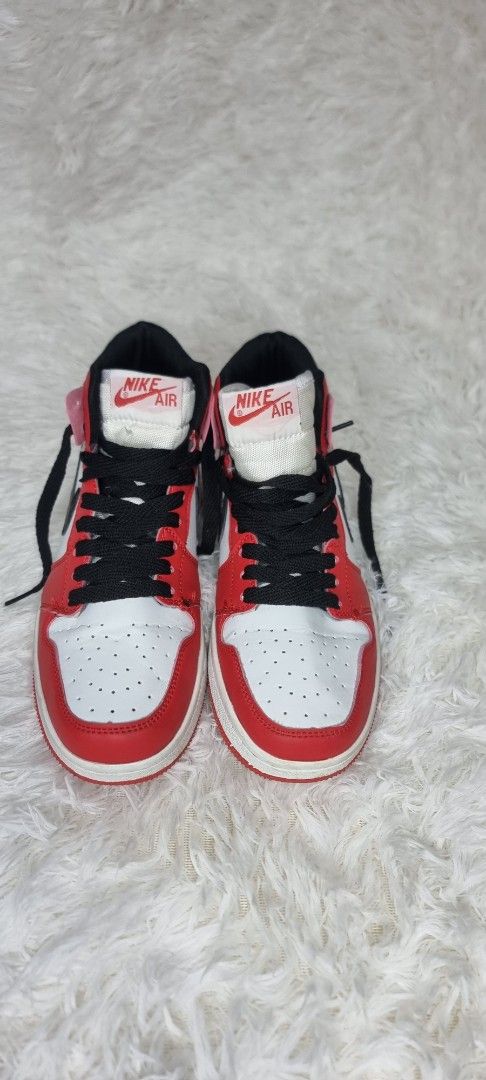 Nike Air Jordan 1 Retro High size 36 class A (Category: Sneakers) located in Marikina City. Submitted by andreah_16 (Listing ID 1398060404, Image 3). Description: - Nike Air Jordan 1 Retro High - Colorway: Red, White, and Black - Features Nike swoosh - Black laces - Red sole - Nike Air logo on tongue -class A -used once.