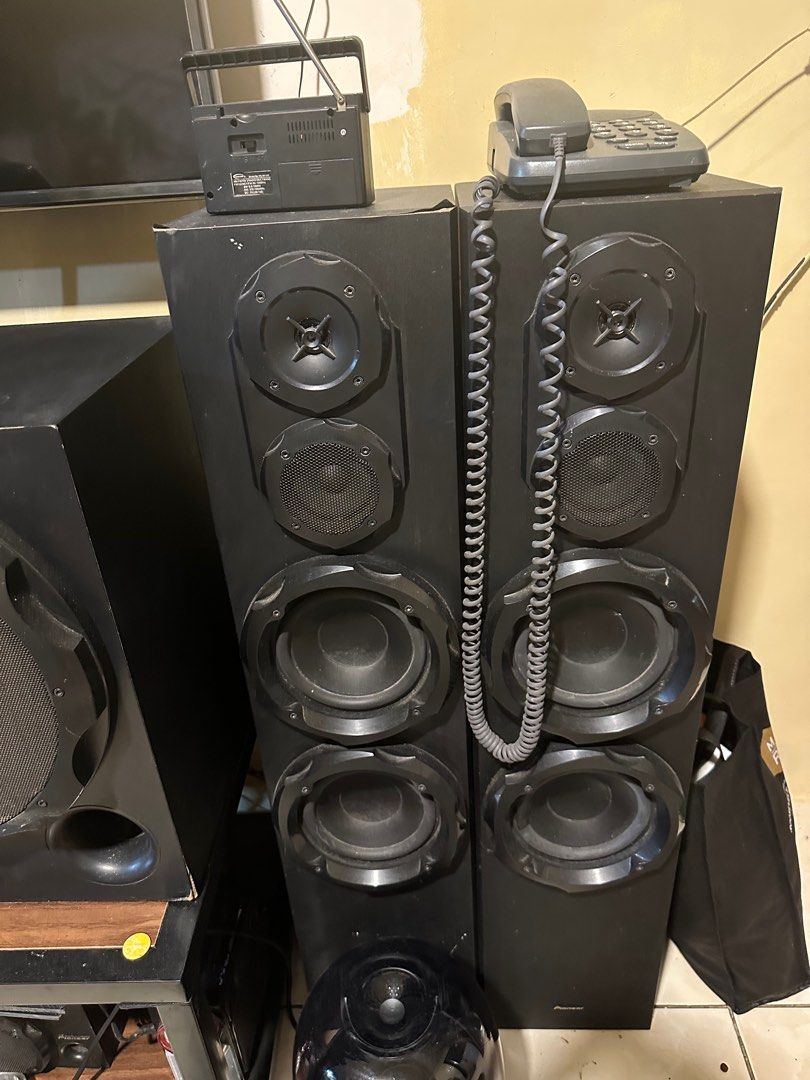 Pioneer Speaker Set with Subwoofer (Category: Soundbars, Speakers & Amplifiers) located in Mandaluyong City. Submitted by grace.dt (Listing ID 1398026176, Image 1). Description: - Complete Pioneer speaker set - Includes tower speakers, subwoofer, and satellite speakers - Features a receiver and DVD player - All necessary components for a home entertainment system - Black color - Includes remote control.