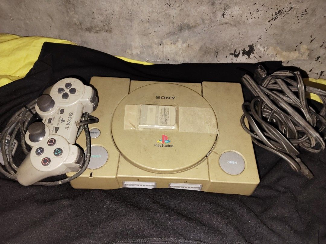 Playstation 1 (Category: PlayStation) located in Mandaluyong City. Submitted by paulampsells (Listing ID 1398038538, Image 3). Description: negotiable playstation. name your price, as I really don't know if it's still working cause I can't test it.. but it sure is working before it went to the storage...this thing is just sitting inside the cabinet for so many years.. but I know it's rare nowadays, so if there's anyone interested, please message 