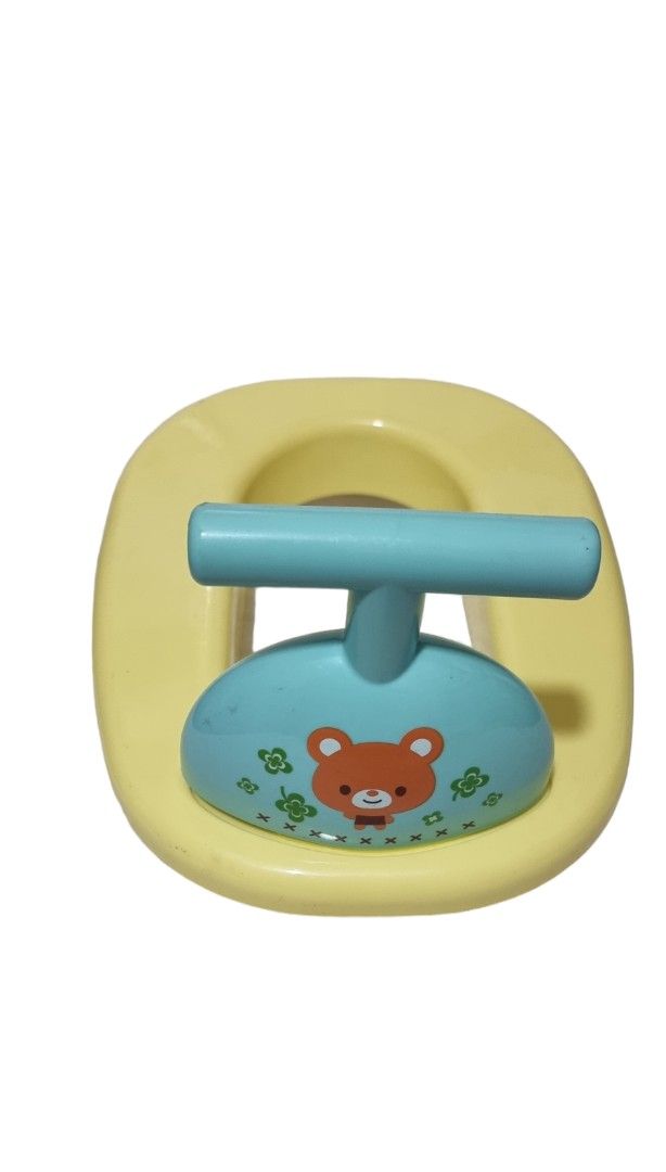 Potty trainer put in a bowl (Category: Weaning & Toddler Feeding) located in Marikina City. Submitted by andreah_16 (Listing ID 1398001300, Image 1). Description: - Adorable potty trainer. - Features a cute yellow and blue design. - Designed to help with potty training. - Easy to clean..