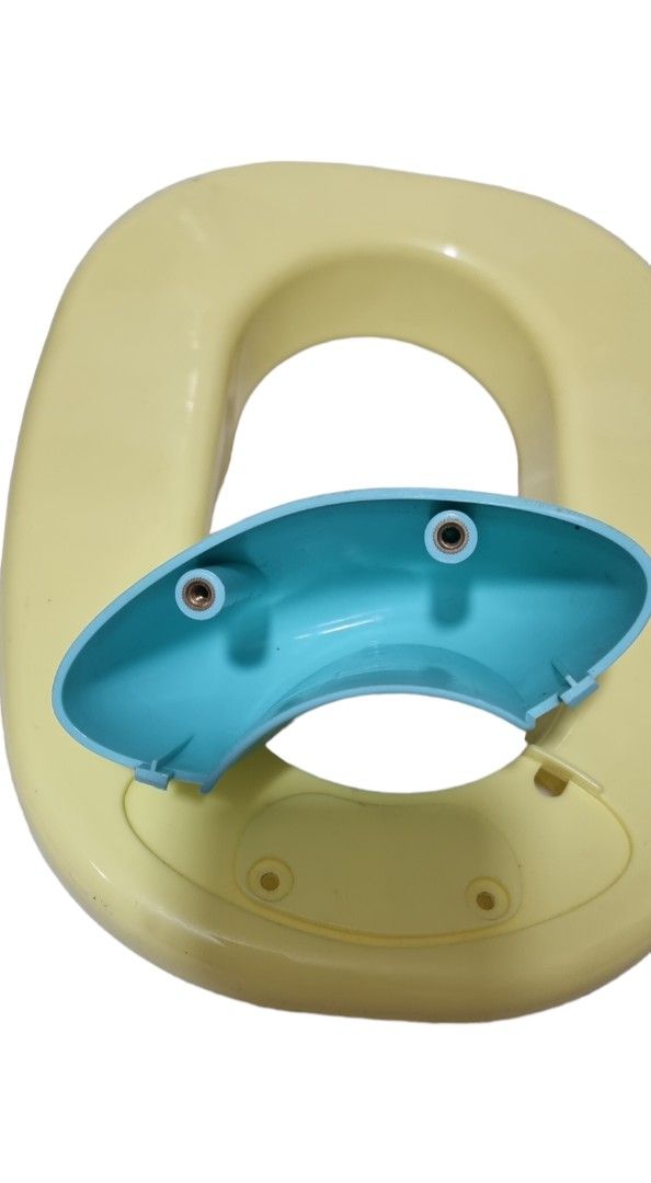 Potty trainer put in a bowl (Category: Weaning & Toddler Feeding) located in Marikina City. Submitted by andreah_16 (Listing ID 1398001300, Image 3). Description: - Adorable potty trainer. - Features a cute yellow and blue design. - Designed to help with potty training. - Easy to clean..