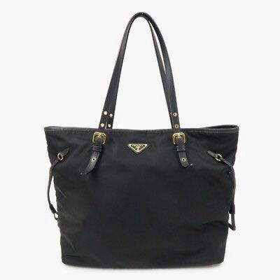 Prada BR4997 Nylon Shoulder Tote Bag with Leather Drawstring- Black (Category: Luxury Bags & Wallets) located in Paranaque City. Submitted by sillybella (Listing ID 1398022779, Image 1). Description: Lower Shipping fee check out c/o orange app Prada classic tote is crafted in durable & light-weight nylon & trimmed in saffiano leather. Ideal for the sophisticated lady who prefers an understated bag with effortless practicality. Fits A4-sized folde