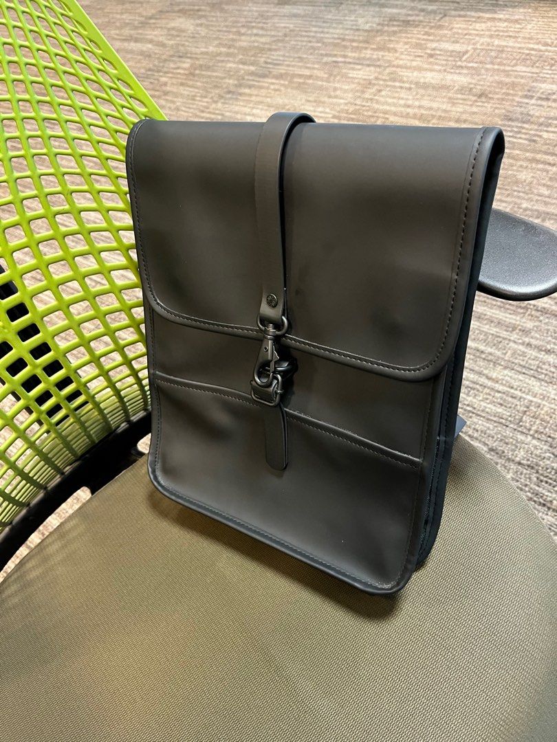 Rains Backpack (Category: Backpacks) located in Taguig. Submitted by bilmoko (Listing ID 1398065389, Image 2). Description: - Sleek, minimalist Rains backpack. - Waterproof material. - Secure flap closure with buckle. - Comfortable adjustable shoulder straps. - Ideal for daily use. .