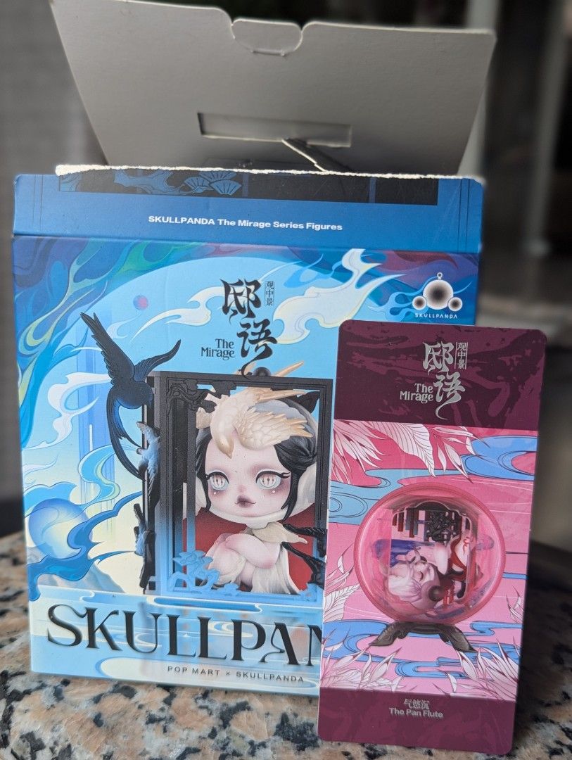 Skullpanda The Mirage Series Figure (Category: Designer & Blind Box Toys) located in Muntinlupa City. Submitted by jomfrey (Listing ID 1398032864, Image 1). Description: Collectible Skullpanda figure from The Mirage Series. Includes the original box and a collectible card. The figure features a unique design with intricate details. Perfect for collectors or fans of Skullpanda. terms of payment will be via bpi or gcash.