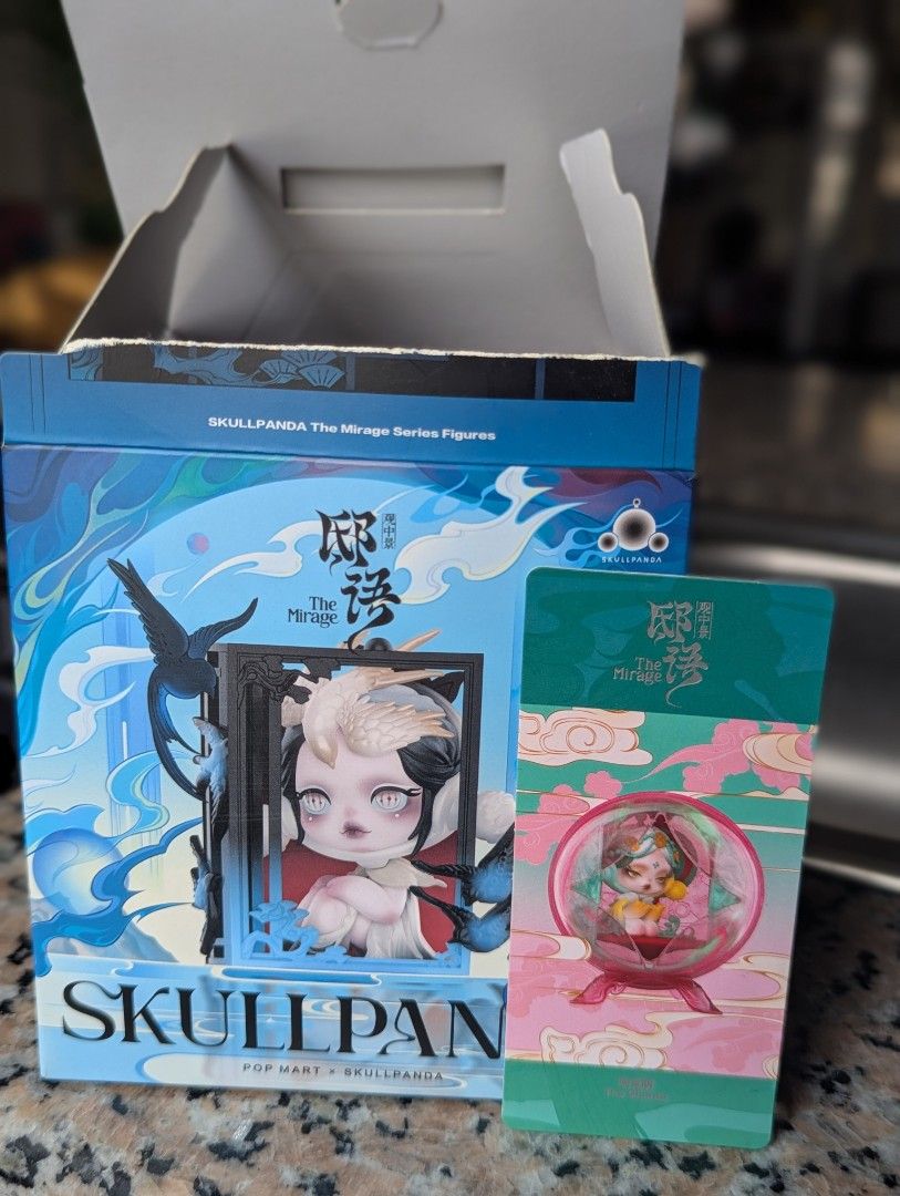 Skullpanda The Mirage Series Figure (Category: Designer & Blind Box Toys) located in Muntinlupa City. Submitted by jomfrey (Listing ID 1398032864, Image 2). Description: Collectible Skullpanda figure from The Mirage Series. Includes the original box and a collectible card. The figure features a unique design with intricate details. Perfect for collectors or fans of Skullpanda. terms of payment will be via bpi or gcash.