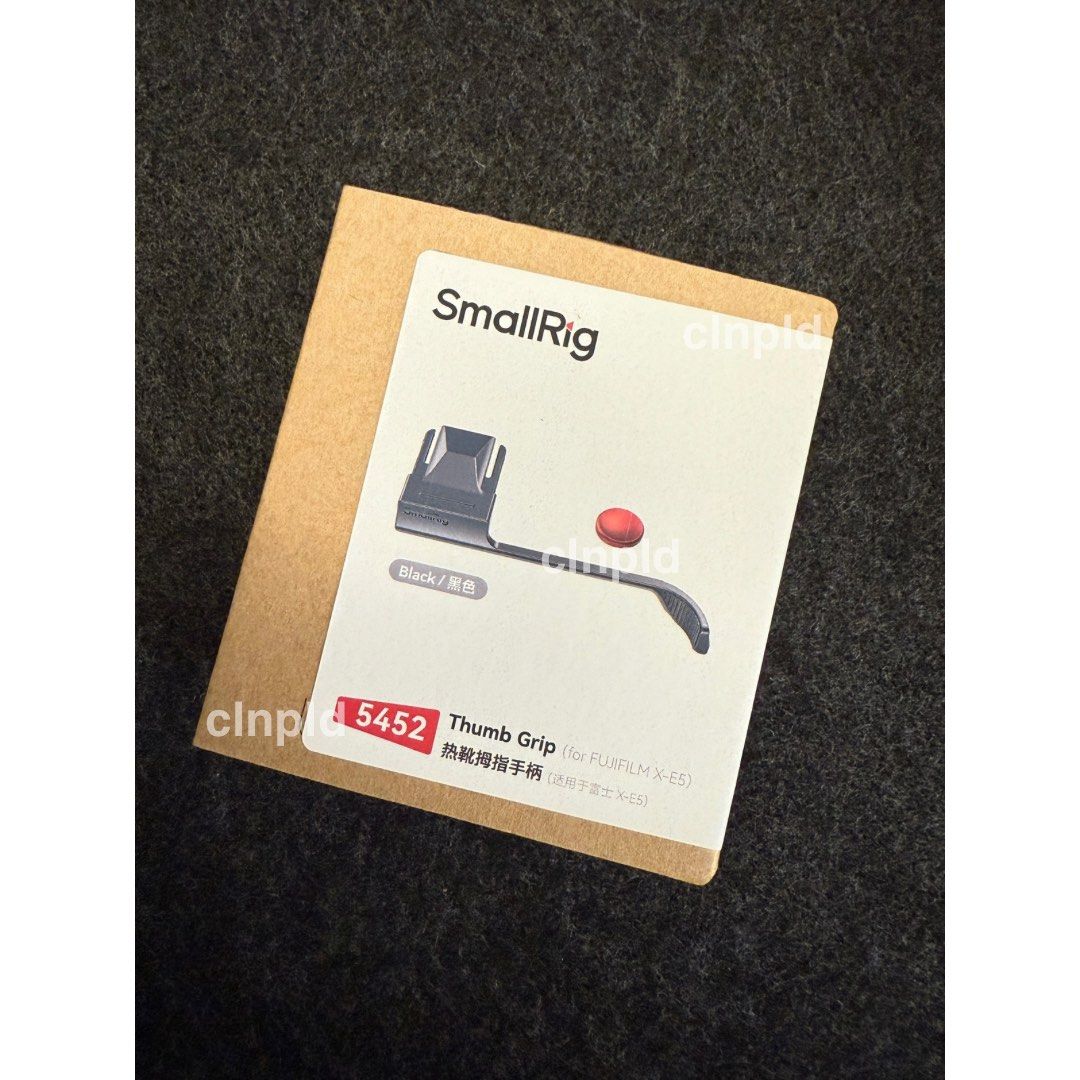SmallRig Thumb Grip for Fujifilm X-E5 (Category: Camera Bags & Carriers) located in Pasig City. Submitted by clnpld (Listing ID 1398104555, Image 1). Description: SmallRig Thumb Grip for Fujifilm X-E5 Black with Soft Shutter Release -got an extra so selling it the same price I got it -brand new, never opened -with soft shutter release (red color) -for Fujifilm X-E5 Location: Pasig City, MM or Angeles, Pampanga (Will schedule shipping).