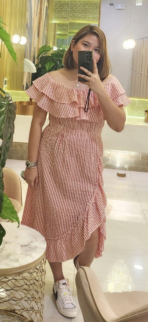 Striped Ruffle Dress (Category: Dresses) located in Manila. Submitted by tealmint (Listing ID 1397975900, Image 2). Description: - Red and white striped pattern - Off-shoulder design - Ruffle details - Wrap-style skirt - High Quality fabric - Fitted waist - Midi length - Ideal for casual wear and summer -Best Fit Large 30 to 32in -Used Twice.