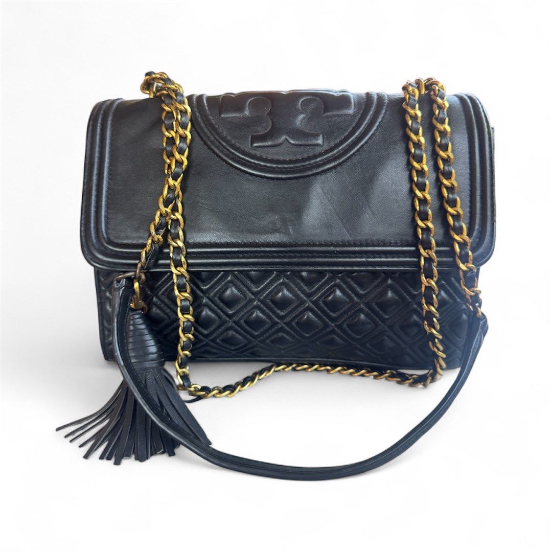 tory burch (Category: Luxury Bags & Wallets) located in Lingayen. Submitted by lux_thrift (Listing ID 1398003943, Image 2). Description: SALE fleming bawal po sa maselan approximately 10.5 x 8.5 main issue rubs .