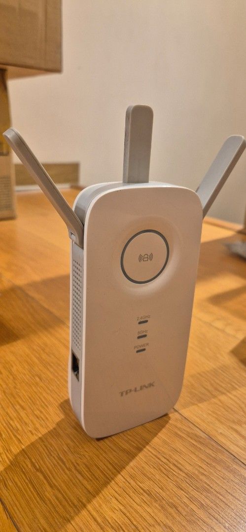 TP-Link wifi range extender AC1200 (Category: Networking) located in Taguig. Submitted by ipsagar (Listing ID 1398018033, Image 1). Description: - model: RE355 - Extends your existing wifi signal - well used but working great - some discoloration (see pic) - crack on left antenna but fixed (see pic) - UK plug price negotiable.